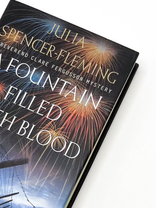 A FOUNTAIN FILLED WITH BLOOD. Julia Spencer-Fleming.
